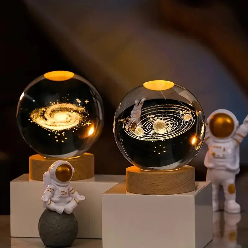 Illuminated crystal sphere with realistic solar system design