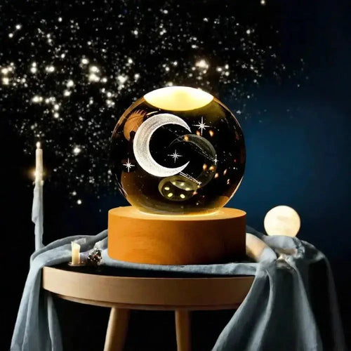 Glass ball lamp featuring a glowing solar system model on a wooden base, ideal for ambient lighting and festive home decoration