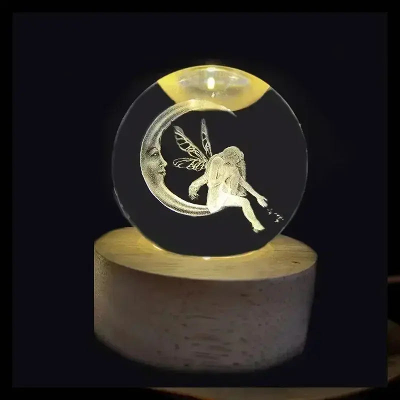 3D etched crystal lamp featuring a detailed solar system design, gently illuminated on a natural wood base — ideal for ambient lighting and gifts.

