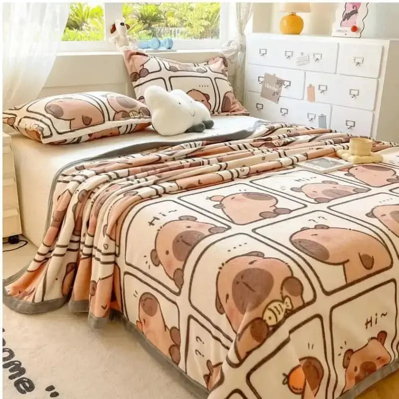 Thin and soft blanket featuring adorable capybara print, perfect for sofa or bed in cooler seasons.