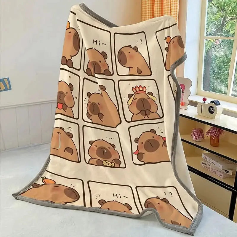 Light and breathable blanket with capybara print, adding warmth and character to any space.
