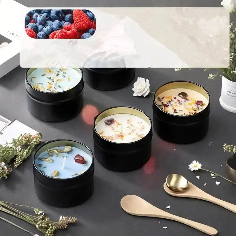 Scented soy candle with dried petals and crystals, encased in a matte iron tin.