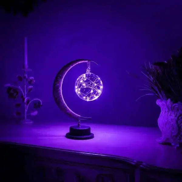 Soft warm LED crescent moon lamp with transparent glass globe – ideal decorative night light for bedroom or living room

