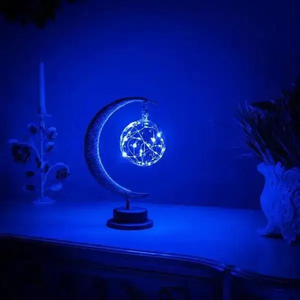 Modern LED crescent moon lamp with illuminated glass globe – stylish decorative nightlight for home ambiance

