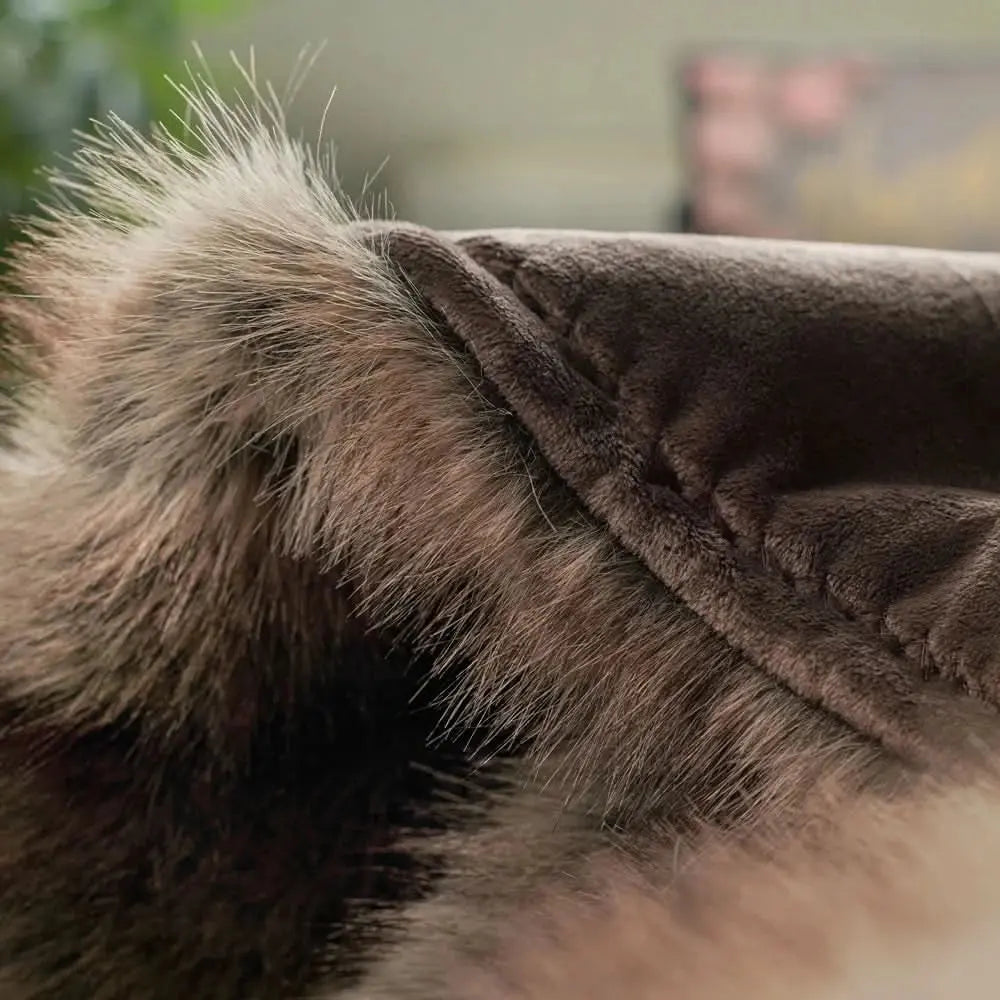 Soft plush decorative blanket in faux fur