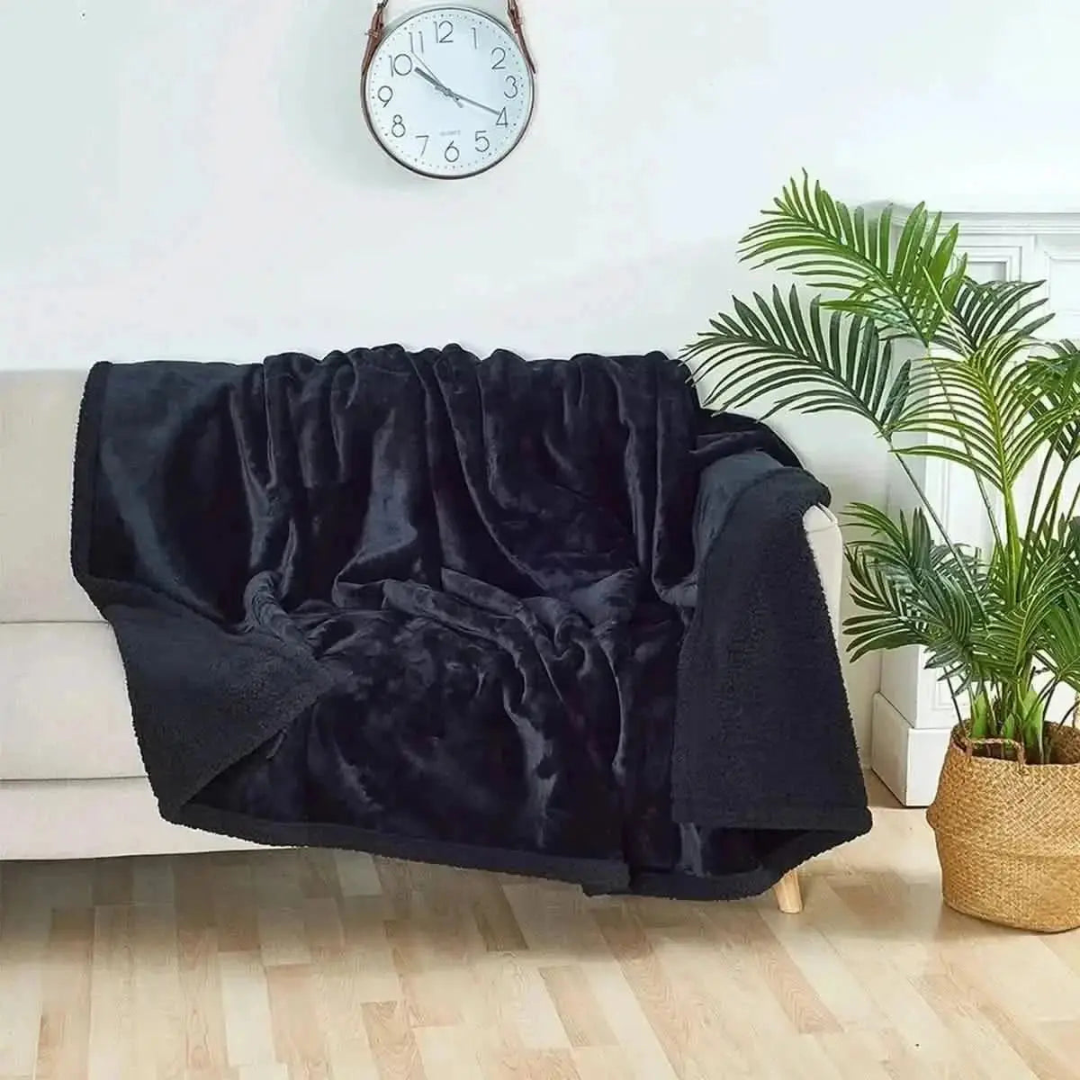 Shaggy microfibre blanket on double bed