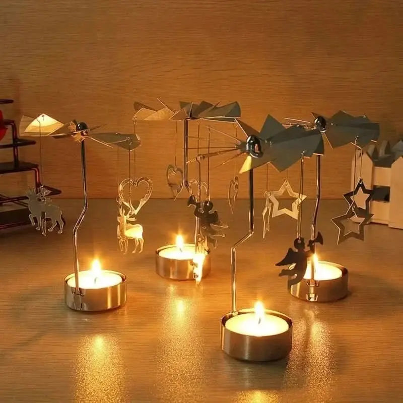 Whimsical rotating tealight candle holder with festive metal accents, ideal for gifting or decor.