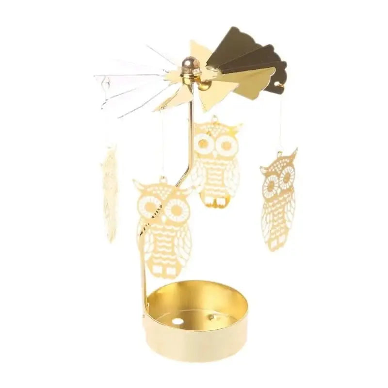 Metal rotating candle holder with golden details, ideal for weddings, parties, or Christmas tables.