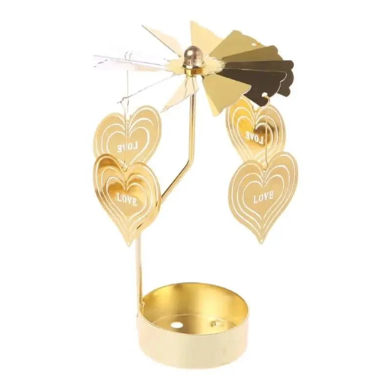 Elegant candle holder with angel-shaped metal charms that rotate with heat, ideal for holiday cheer.