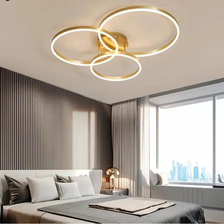 Nordic Creative Round Ring Chandelier – Golden Coffee Lustre Ceiling Light for Bedroom & Living Room ARTHAYA