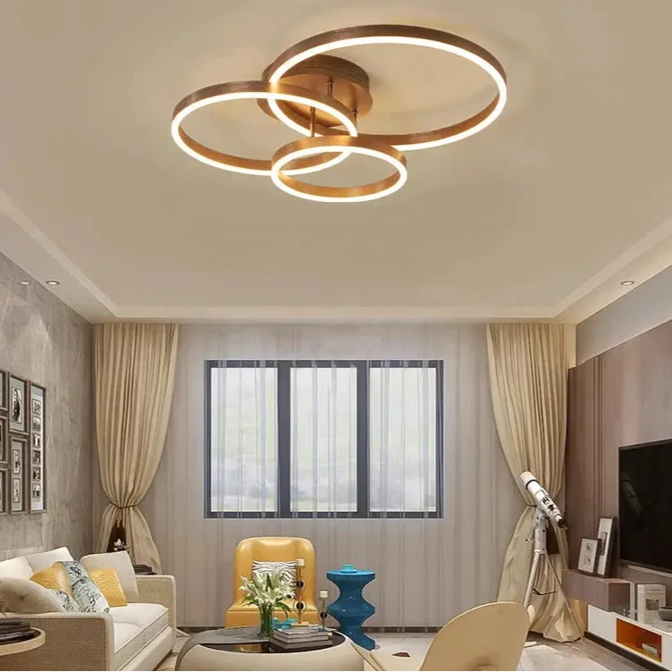 Nordic Creative Round Ring Chandelier – Golden Coffee Lustre Ceiling Light for Bedroom & Living Room ARTHAYA