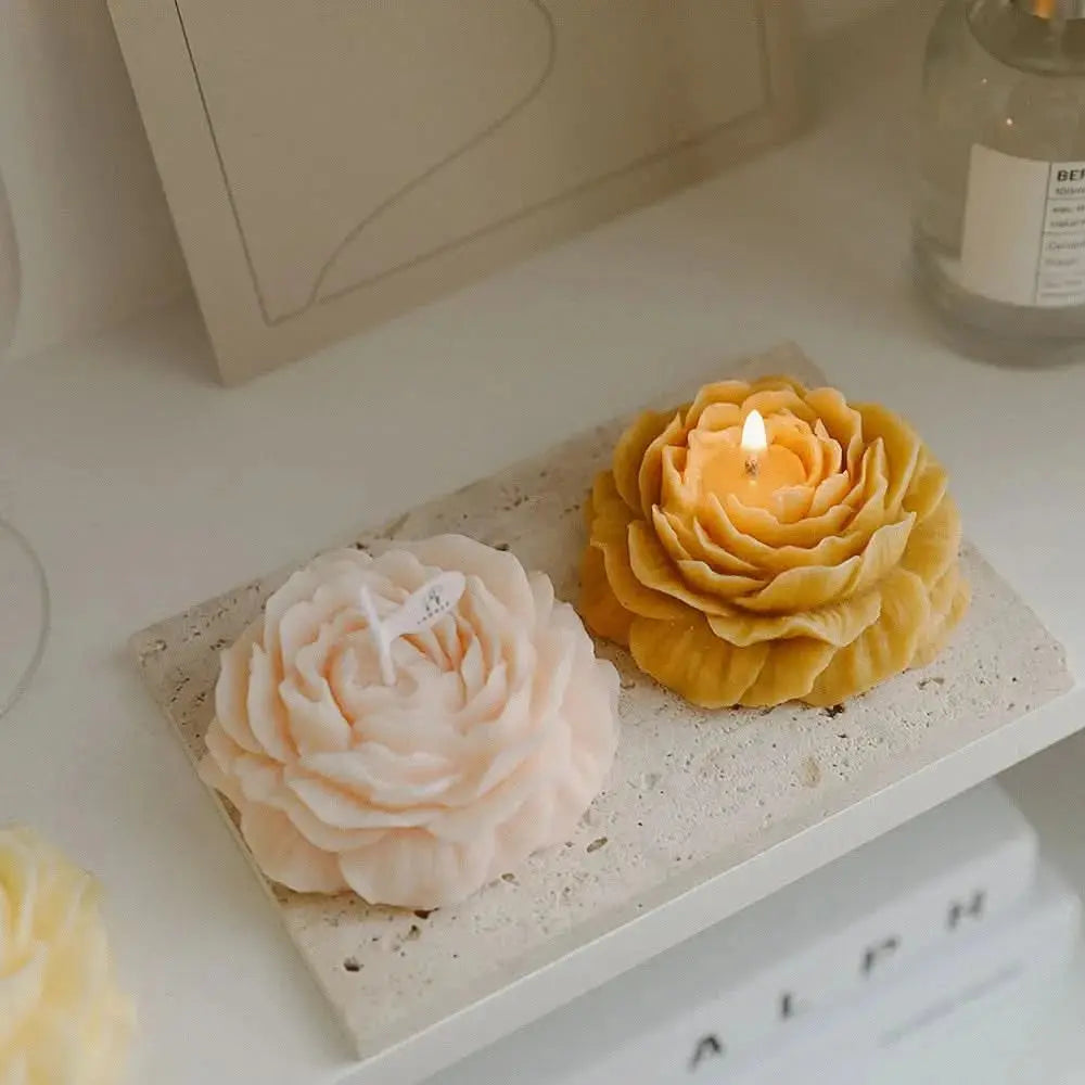 Decorative peony-scented candle in a glass jar, perfect for Mother's Day or birthday presents.


