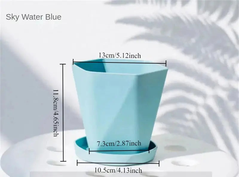 Plastic pot with saucer for water collection