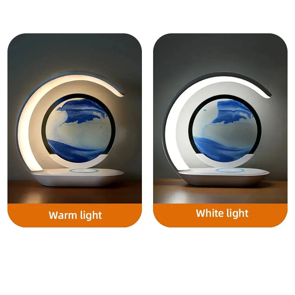 Elegant LED light with a sleek arc shape and a floating blue sand disc being placed by a hand.

