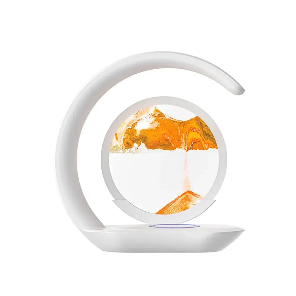 Artistic LED lamp featuring a minimalist arc and a hovering blue sand hourglass being placed by a hand.


