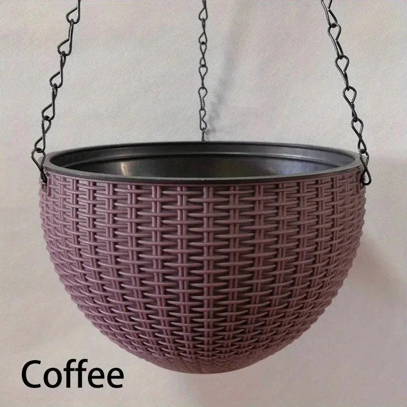 Black round metal planter for outdoor use