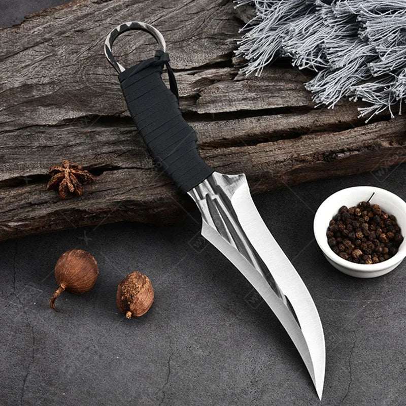 Professional kitchen knife set displayed on countertop

