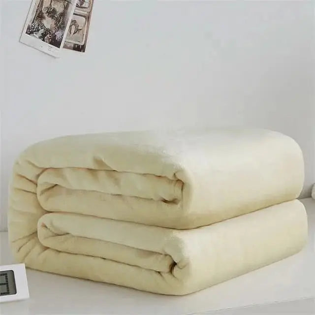 High-quality fleece throw for layering warmth and comfort in solid, stylish tones.