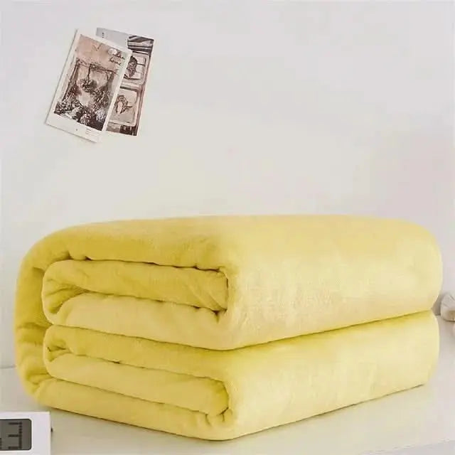Comfortable and colourful fleece throw for the sofa, lounge or guest bed.