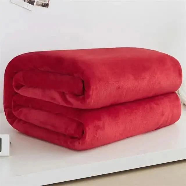 Snuggly fleece throw in modern solid hues, made with breathable and soft material.
