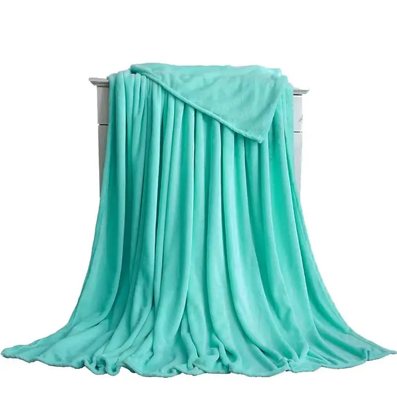 Warm and gentle 230GSM flannel blanket perfect for chilly evenings on the couch.