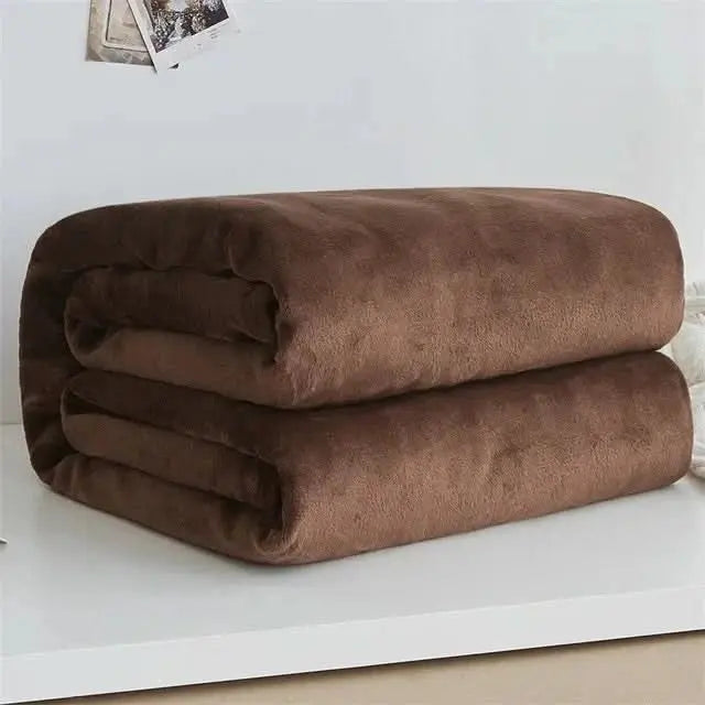 Cosy fleece blanket in muted solid colours, perfect for modern home styling.