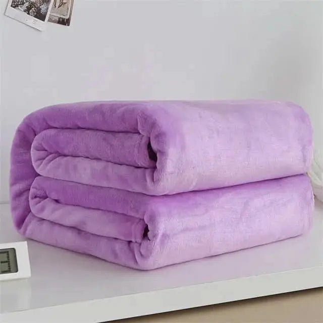 Comfy and stylish fleece throw made from coral flannel, perfect for restful evenings.