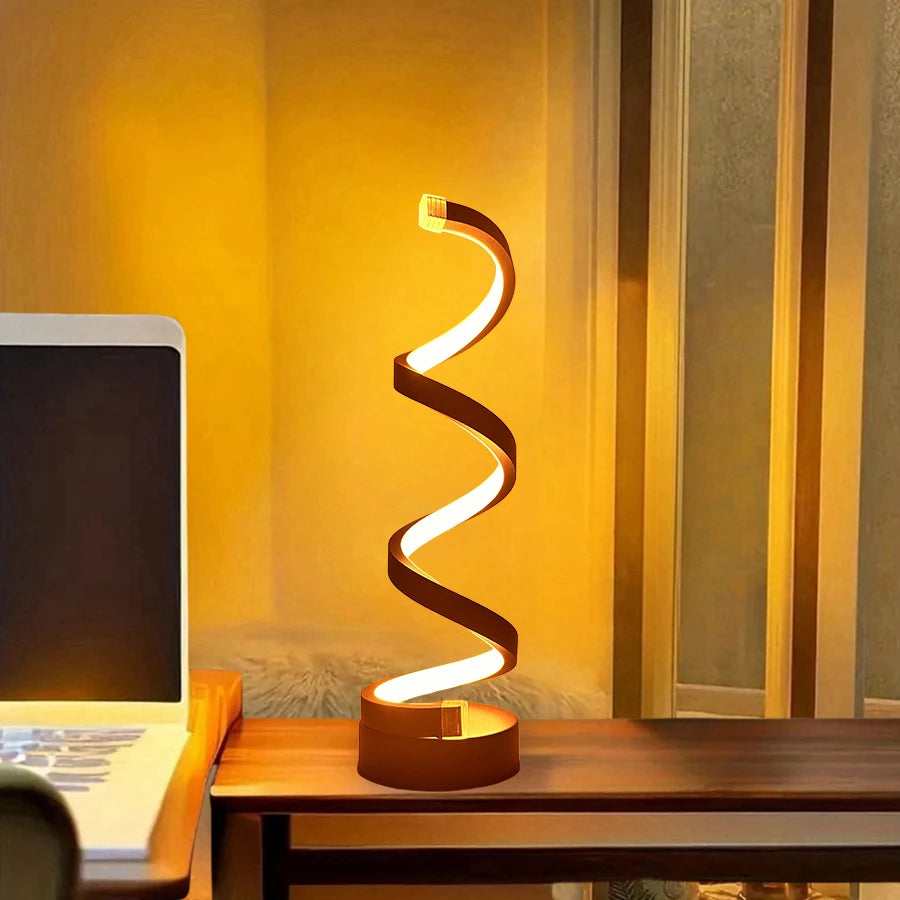 Modern LED table lamp with spiral design on nightstand

