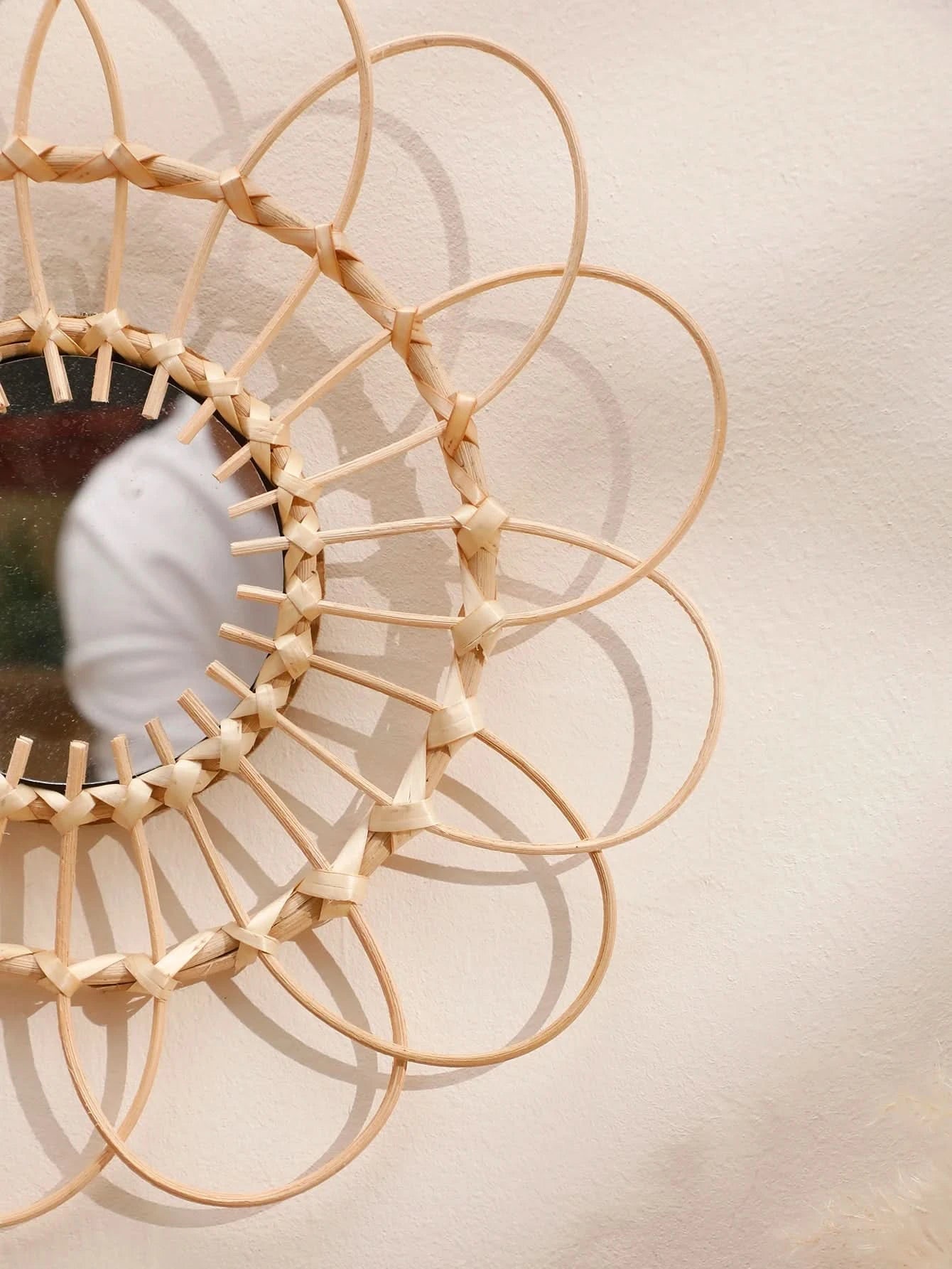 Decorative mirror with woven design