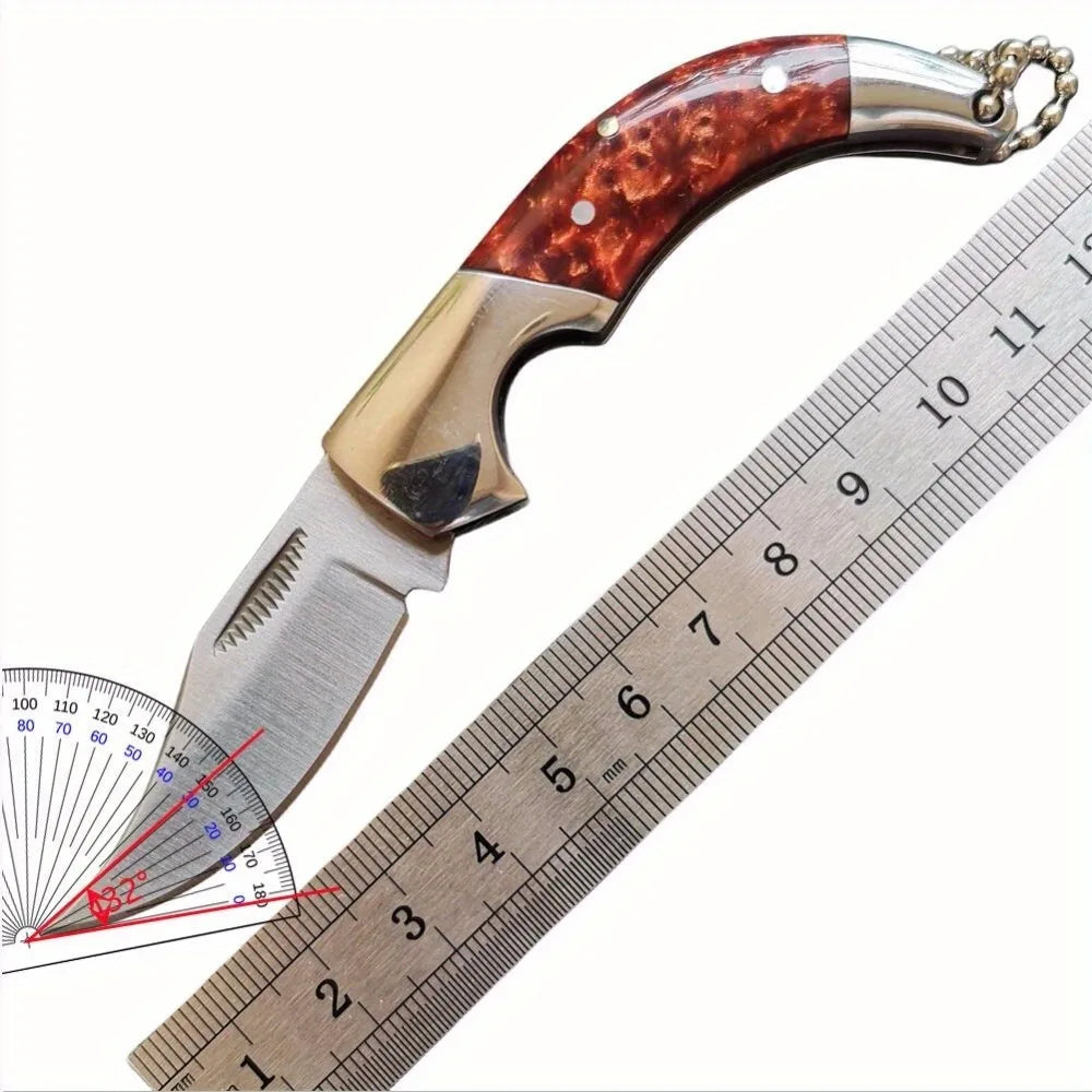 Stylish pocket knife placed on bark background with red leaves

