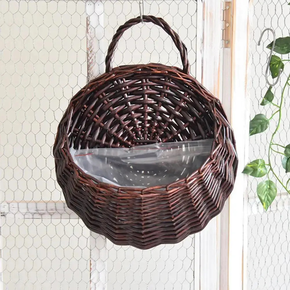 Rustic rattan wall-mounted planter for balcony décor

